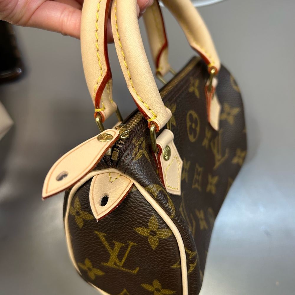Louis Vuitton Brown Mini Monogram Bag with Gold Accents